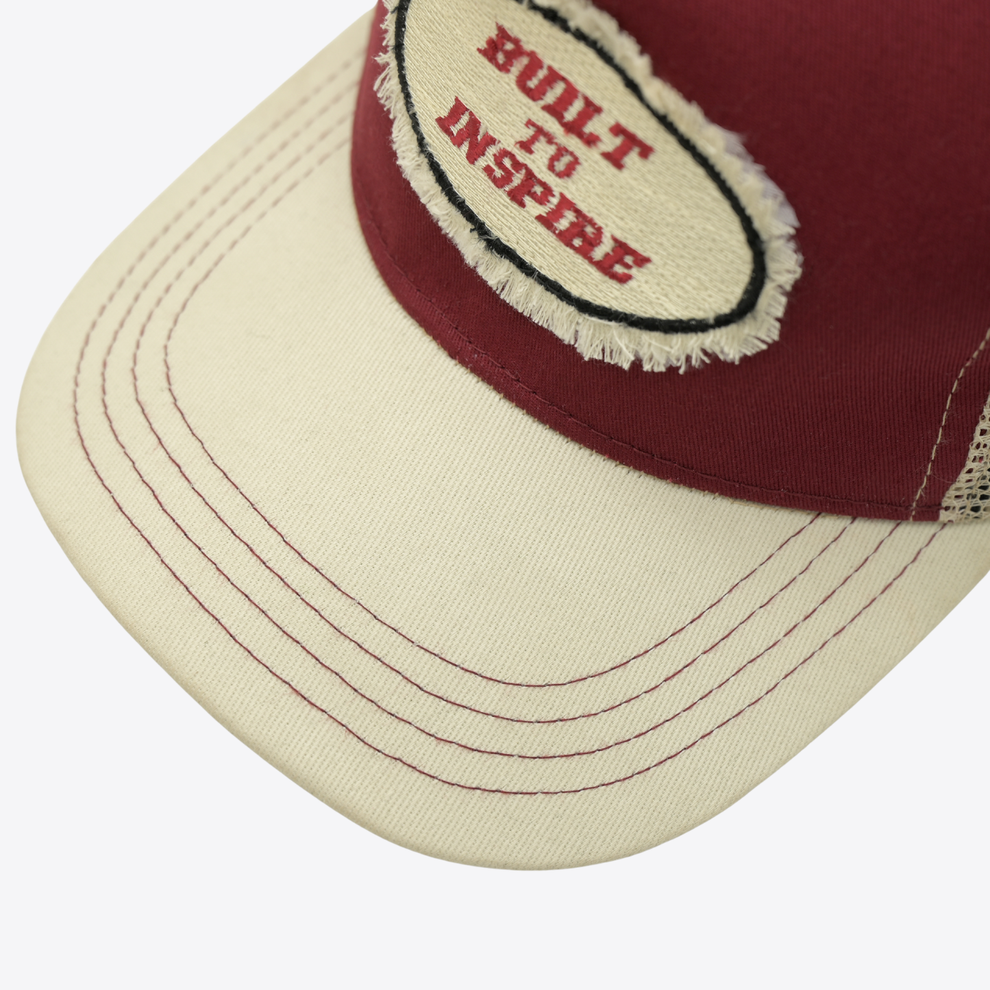 The "Built To Inspire" Distressed Trucker Cap